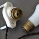 Oval porcelain hook to plug into socket