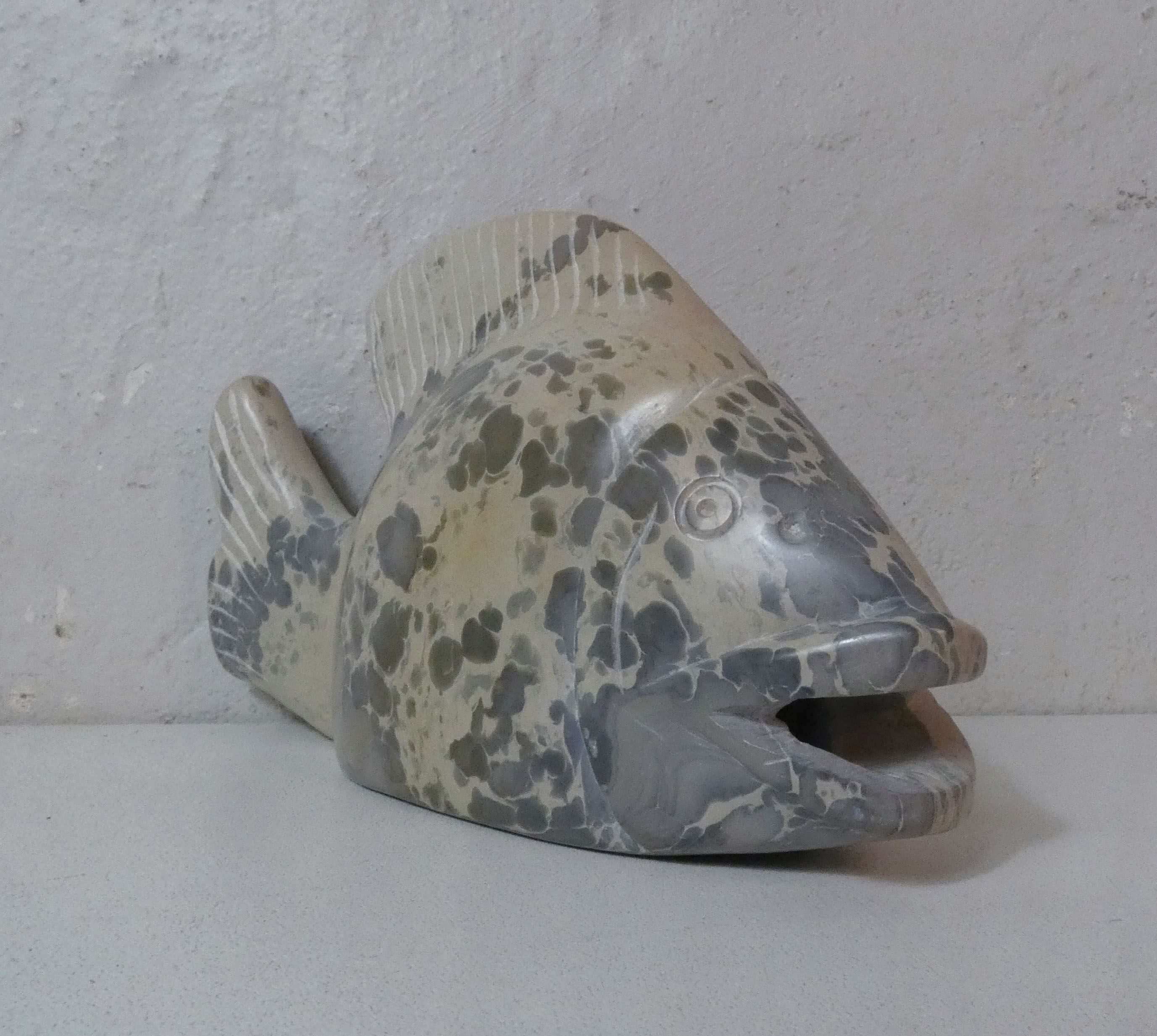 Polished stone fish vintage paper press
