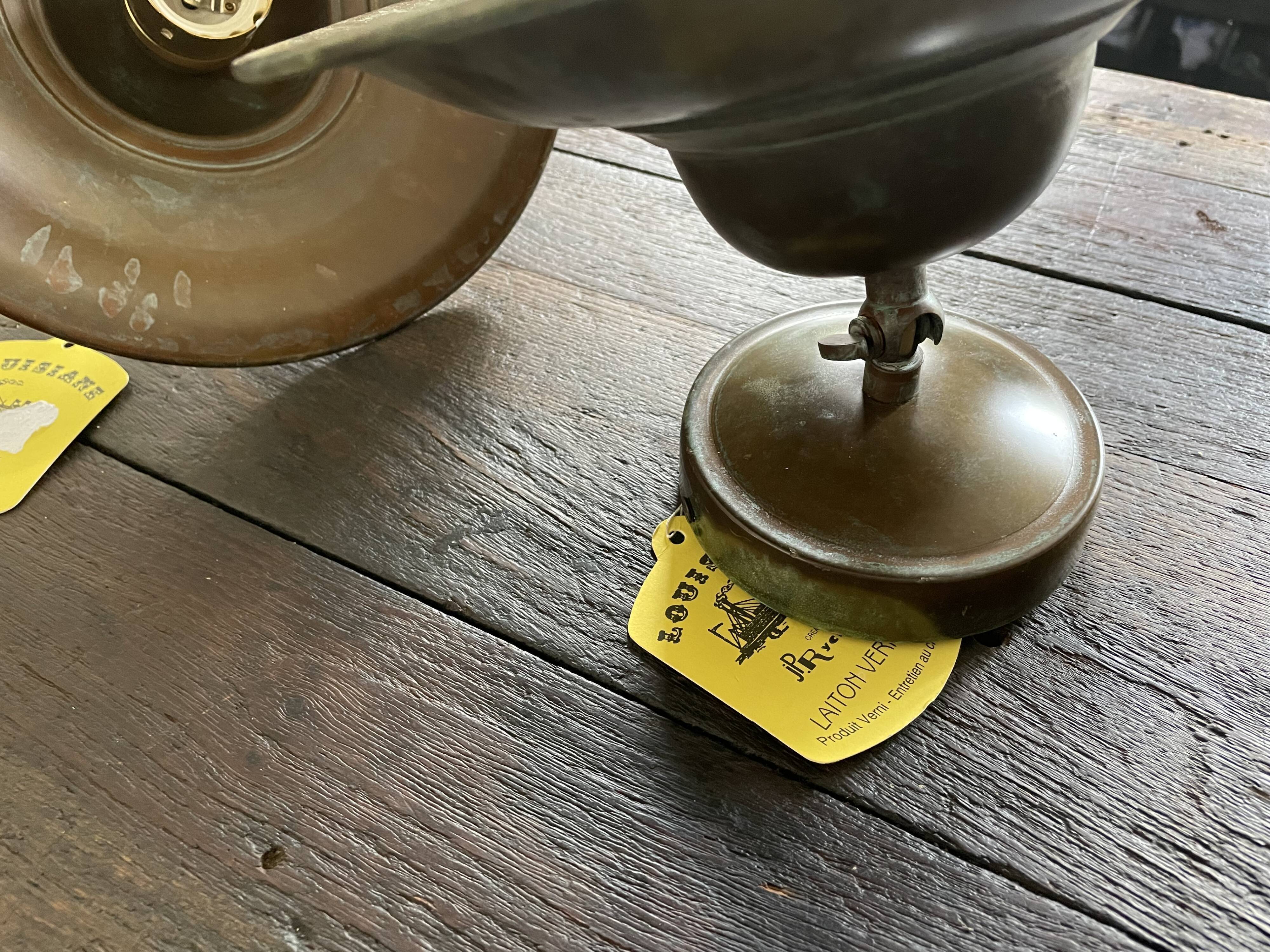 Pair of industrial brass wall lamps