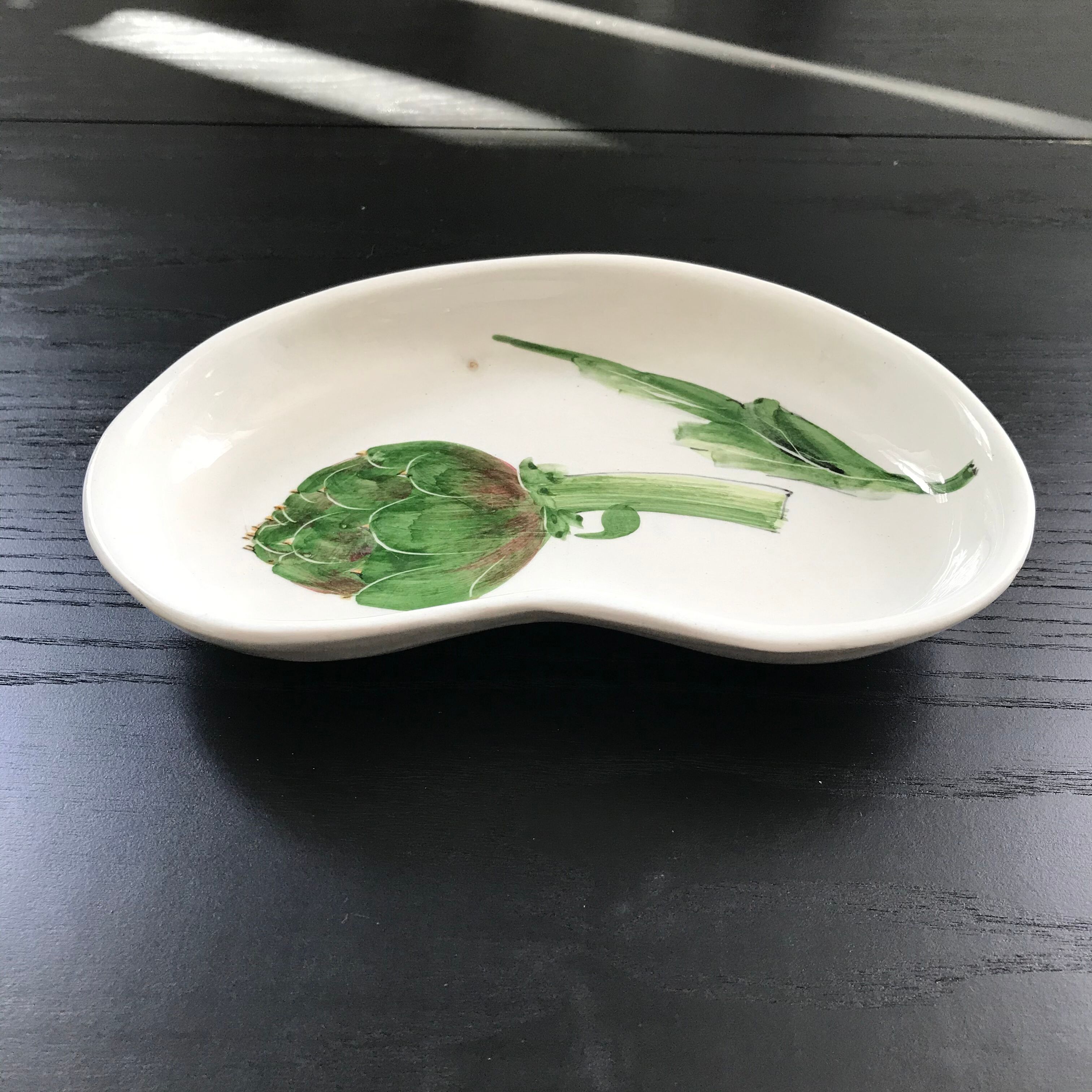 Artichoke decor pocket emptier