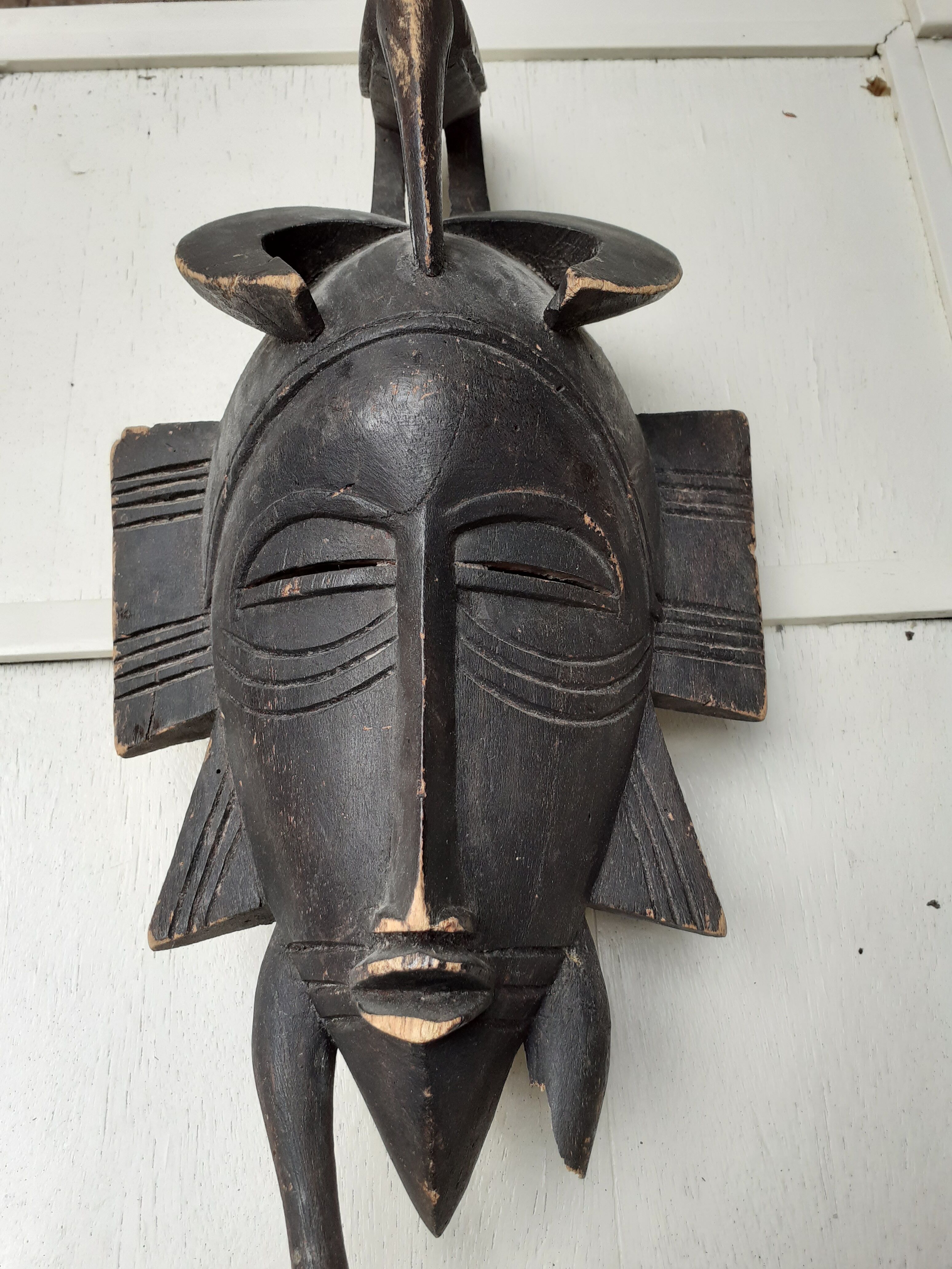 African mask with ibis