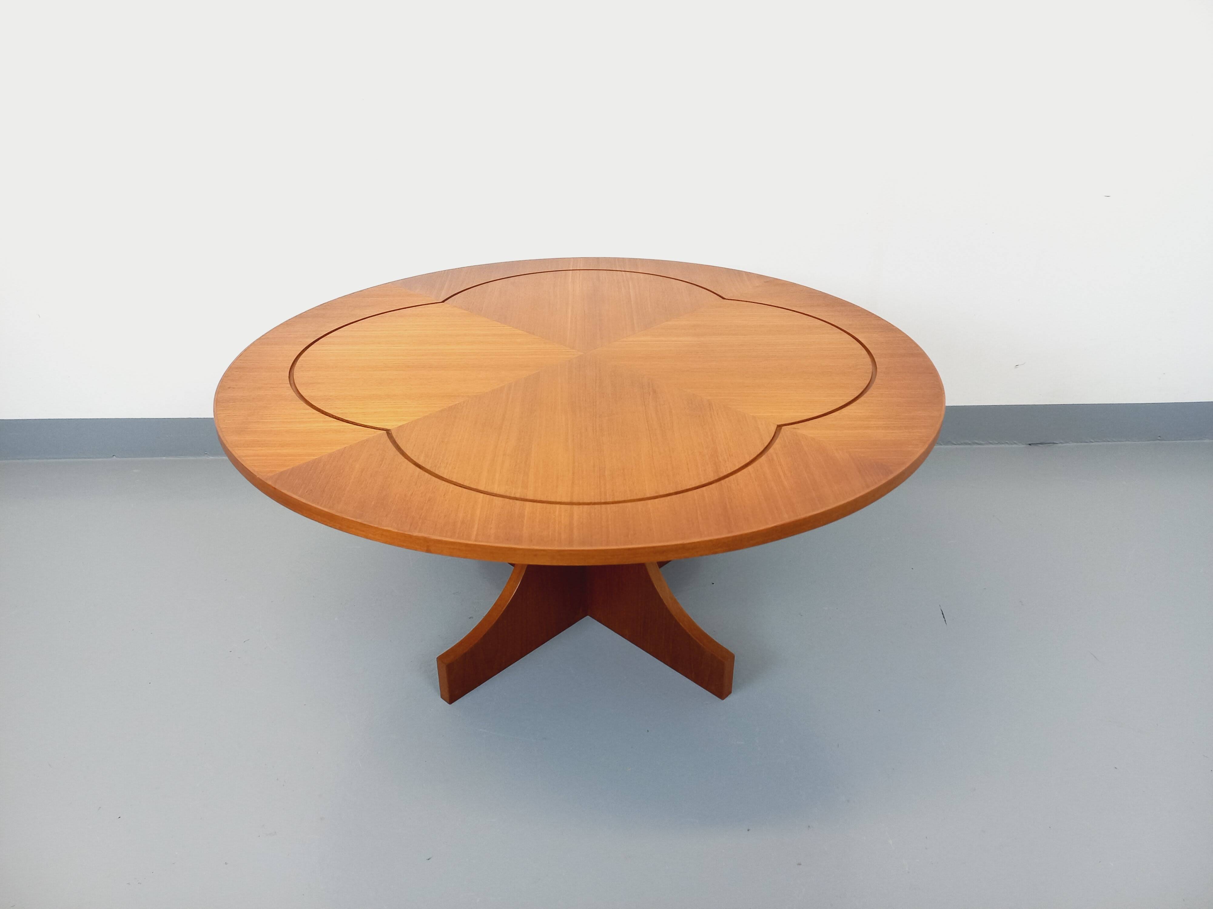 Vintage English round teak coffee table from the 1960s