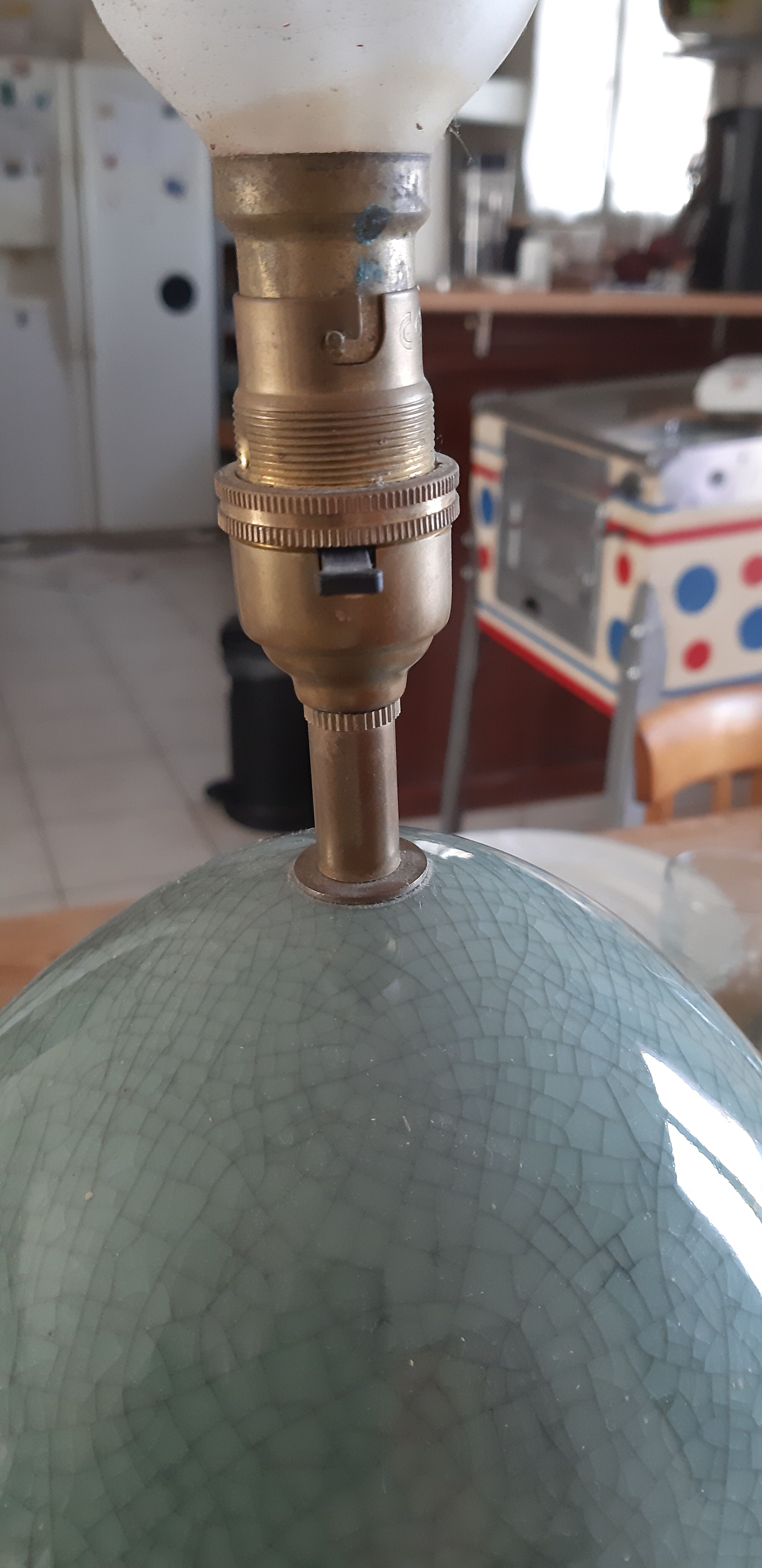 Celadon green cracked earthenware egg lamp foot