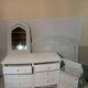 White rattan bedroom set: chest of drawers, mirror, bed, basket