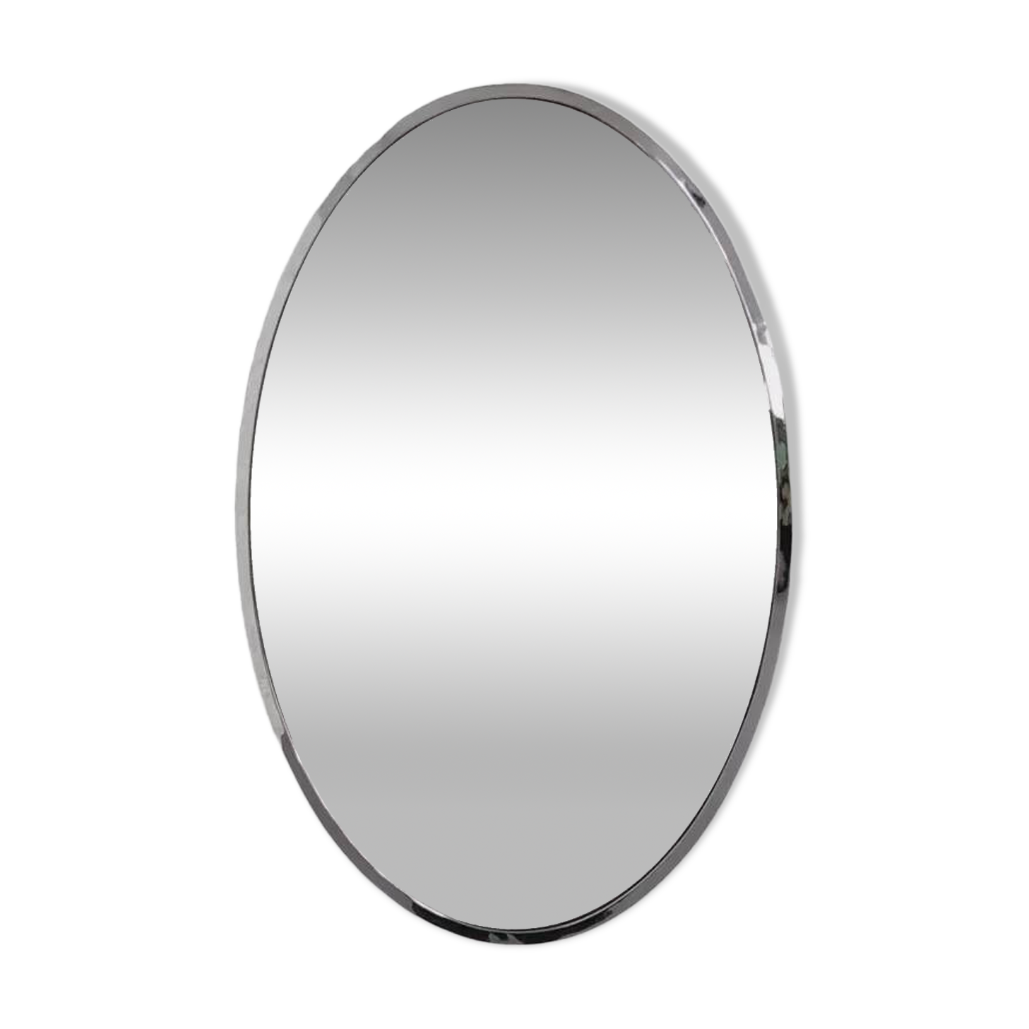 Miroir ovale des années 50 - 60 au contour chromé
