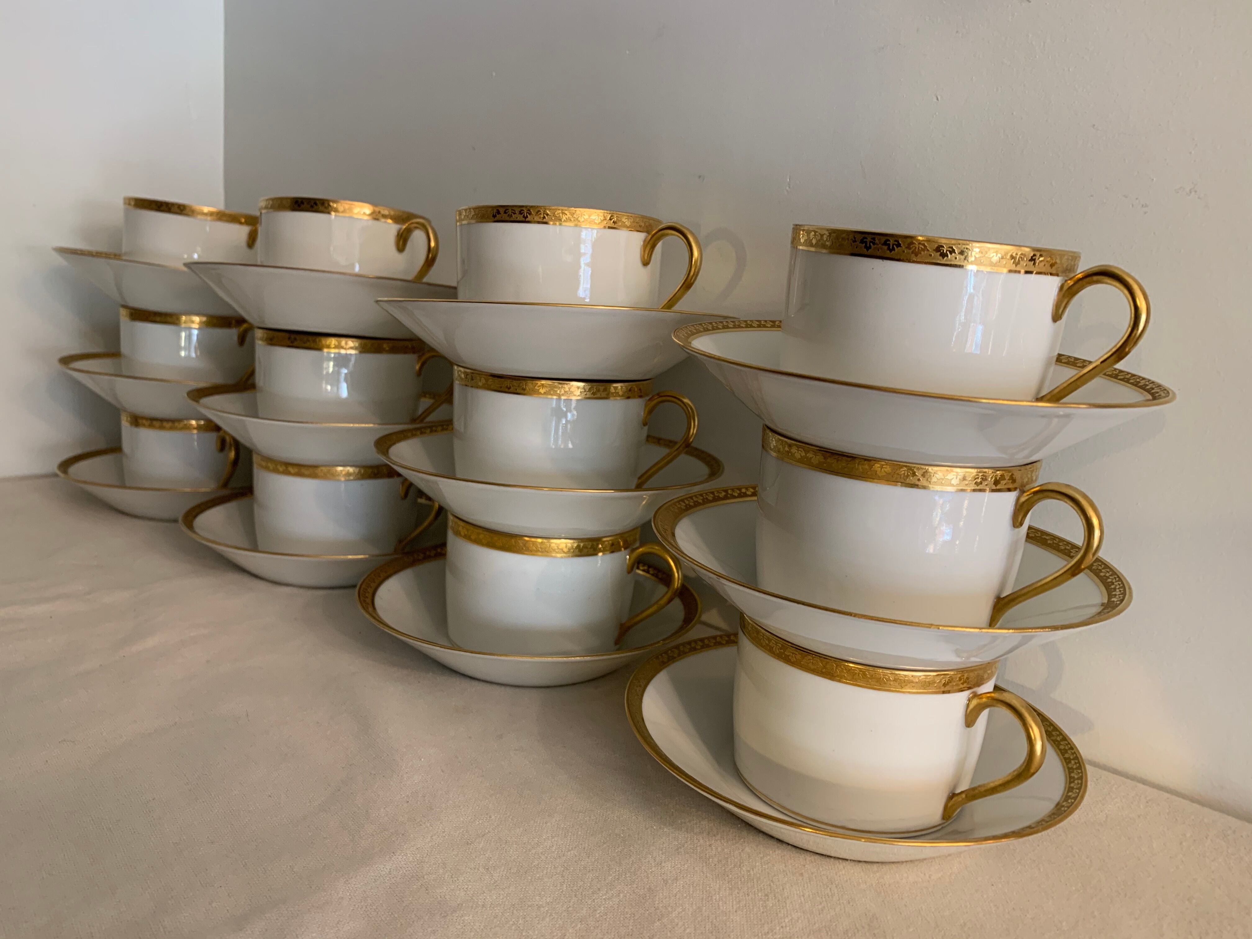 12 coffee cups and 12 white porcelain cups of Gold Gold Limoges