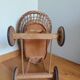 Wicker rattan doll cradle with wheels