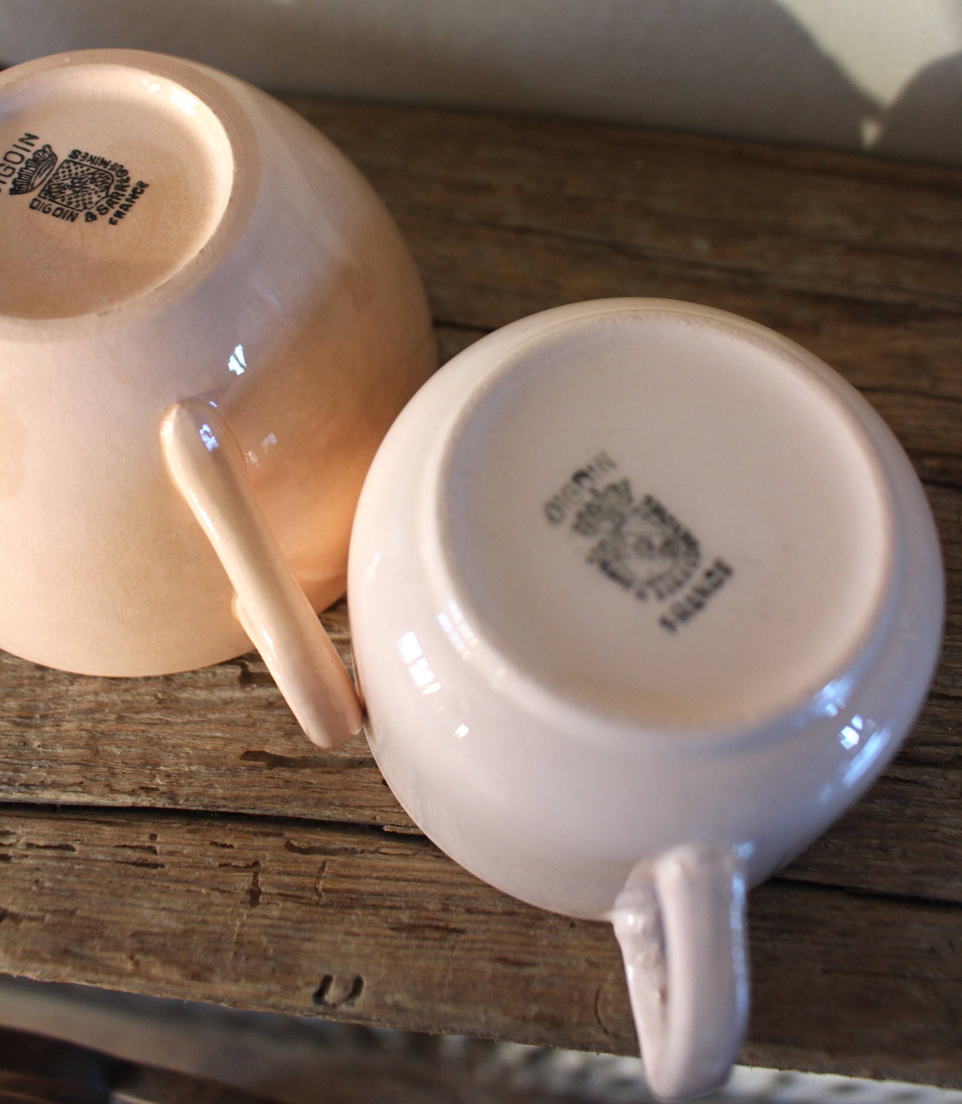 A set of 3 pink earthenware cups from Digoin Sarreguemines.