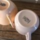 A set of 3 pink earthenware cups from Digoin Sarreguemines.