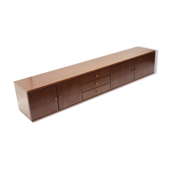 Hanging vintage low sideboard from the 1970s