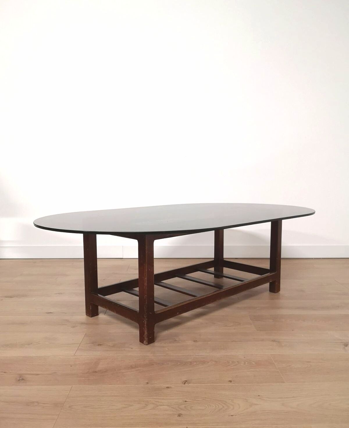 Scandinavian oval smoked glass coffee table