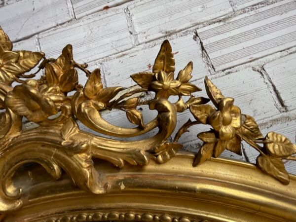 Miroir ovale Louis XV bois doré