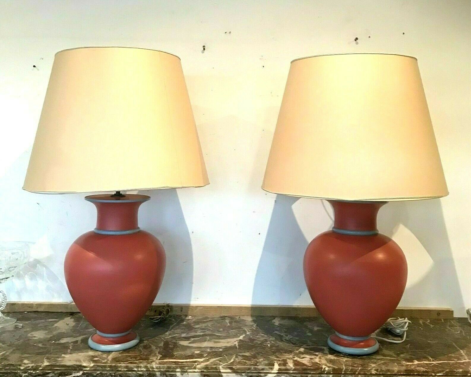 Pair of earthenware lamps with pink and gray patina XX century