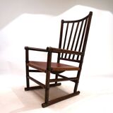 Manou rattan armchair with leather seat, 1960