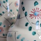 Pair of hand decorated enamelled ceramic vases, 13 cm