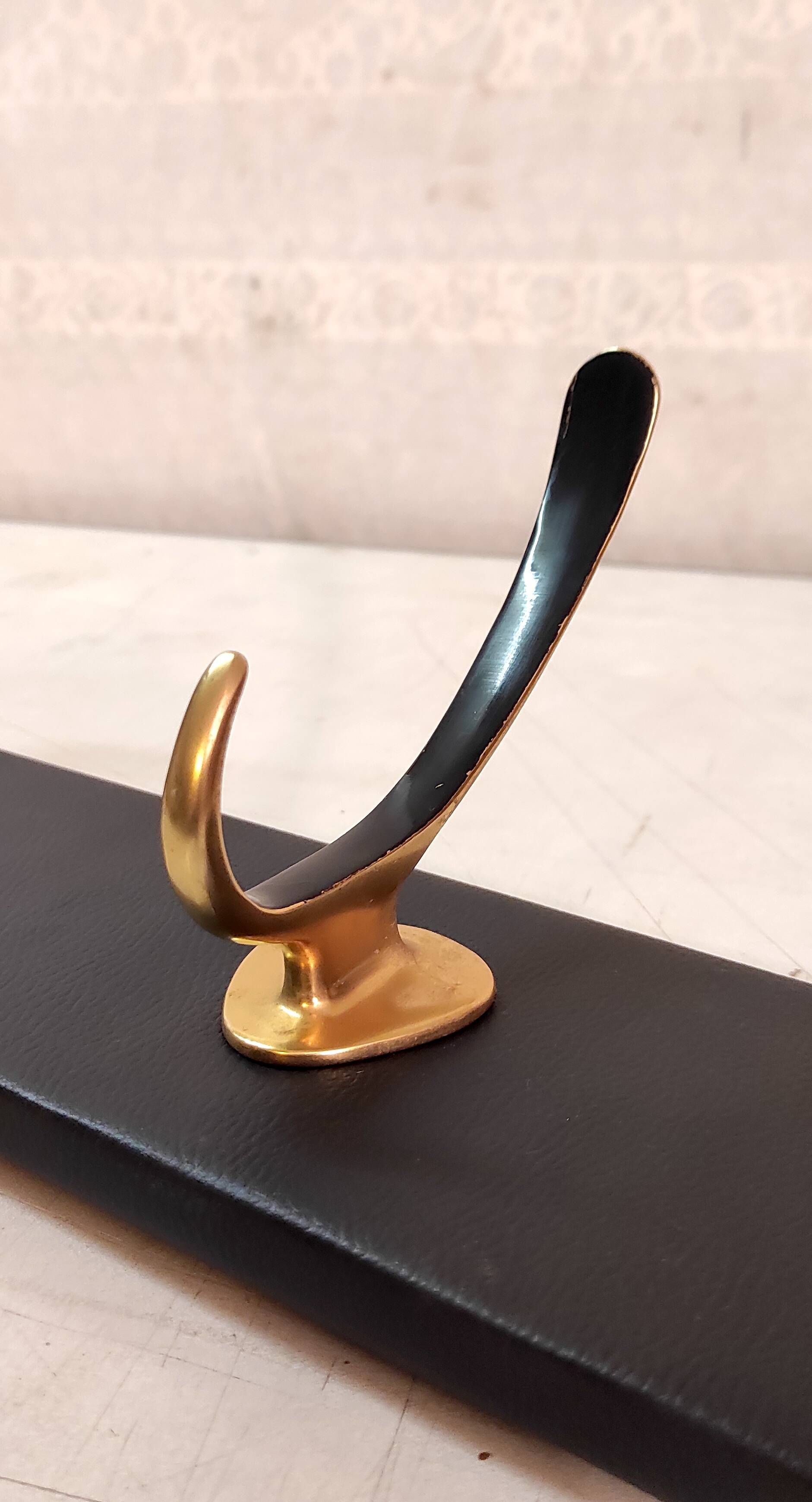 Wall-mounted coat rack in brass, 1950s-60s