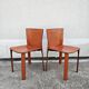 Postmodern pair of leather chairs by Giancarlo Vegni for Fasem 1984