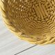 Yellow ceramic basket with wicker effect