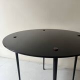 Vintage round black glass coffee table, 1950s