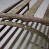 Set of three sculptural iron chairs