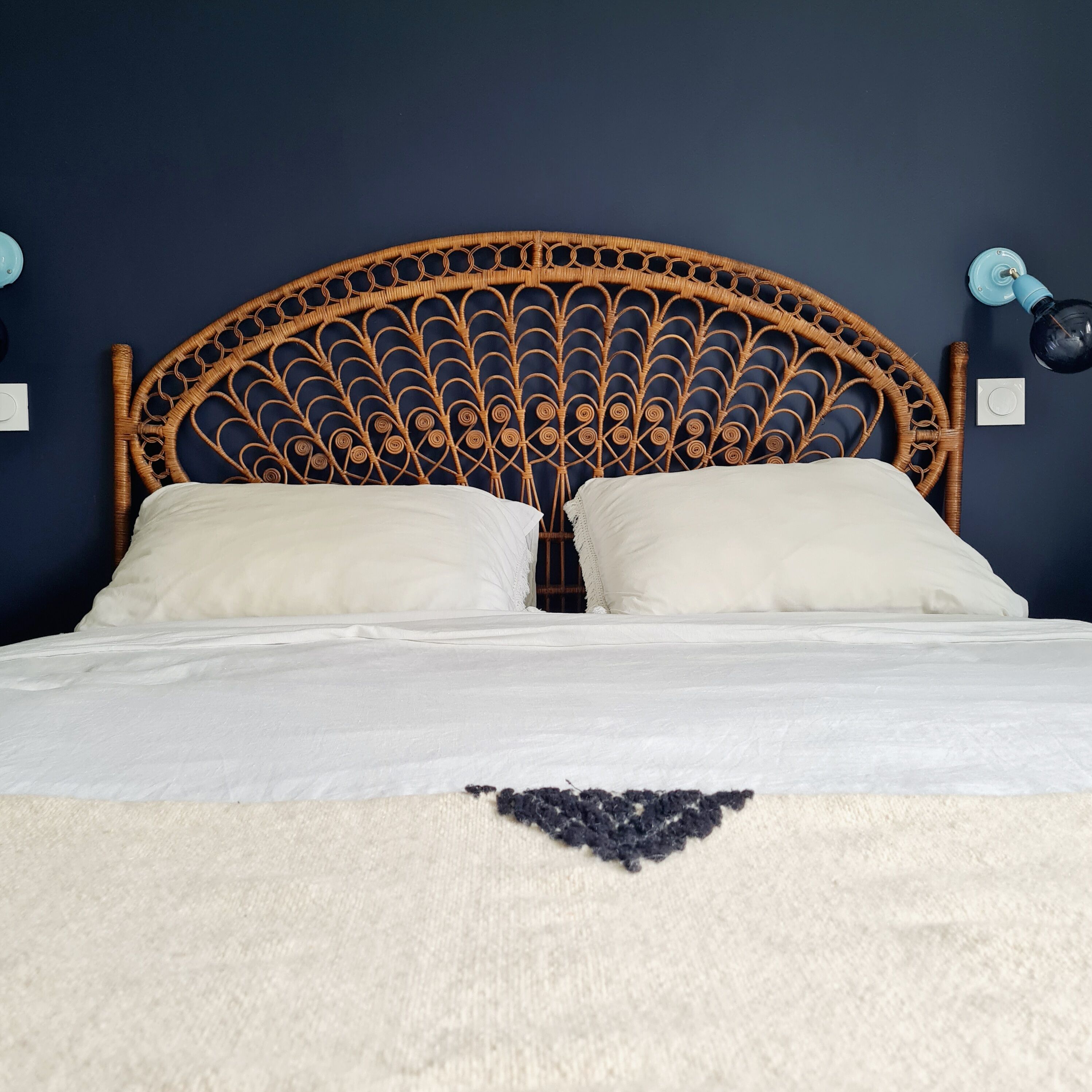 Peacock headboard in vintage rattan