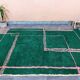 Hand-woven green wool rug, size 150 x 150 cm