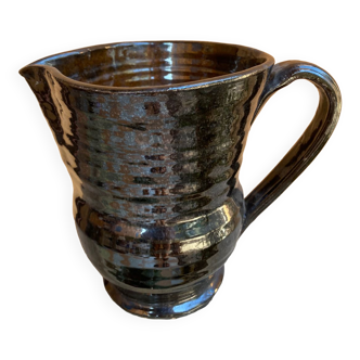 Old glazed terracotta pitcher