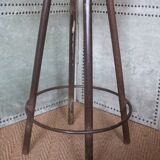 high factory stool made of wood and metal