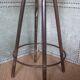 high factory stool made of wood and metal