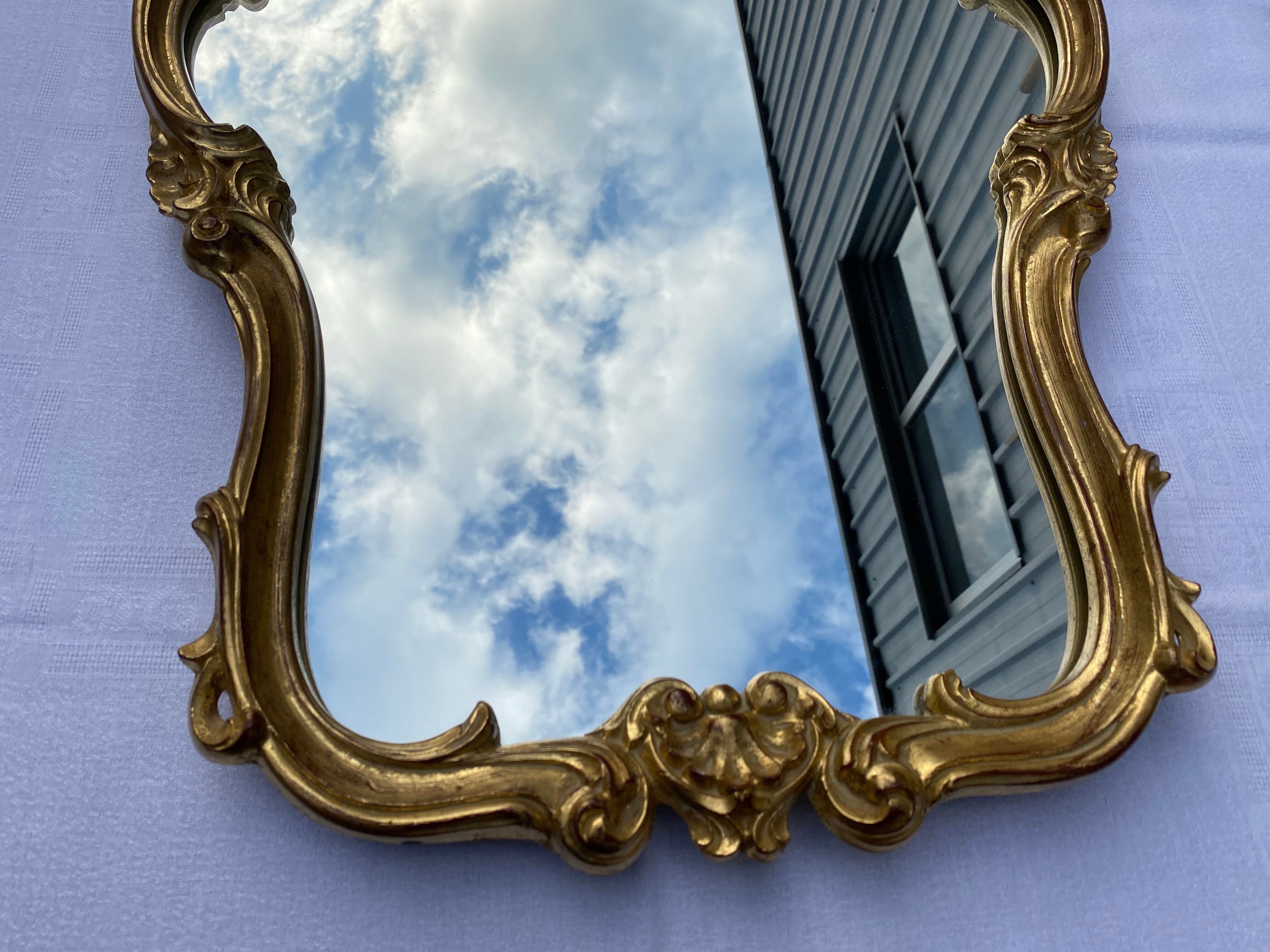 Louis XV-style golden mirror in good shell condition