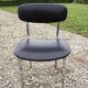 6 vintage chairs in black skaï with chrome metal tubular base.