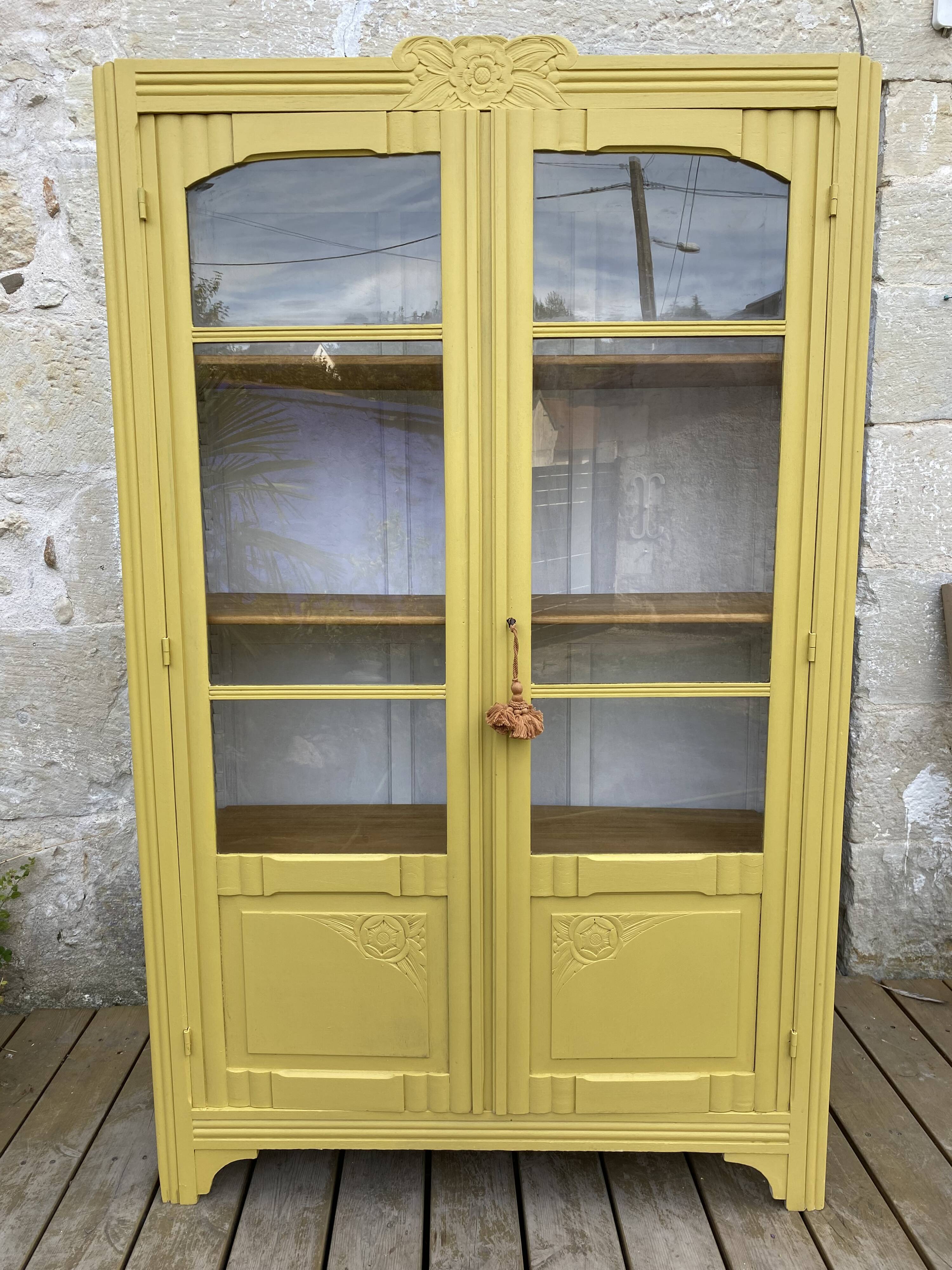 Antique yellow display cabinet