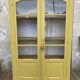 Antique yellow display cabinet