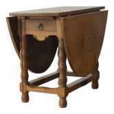 Solid extendable table, sideboard