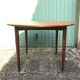 Ancienne table à manger scandinave en bois de teck et pieds compas avec rallonges vintage