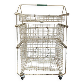 Metal serving trolley on wheels