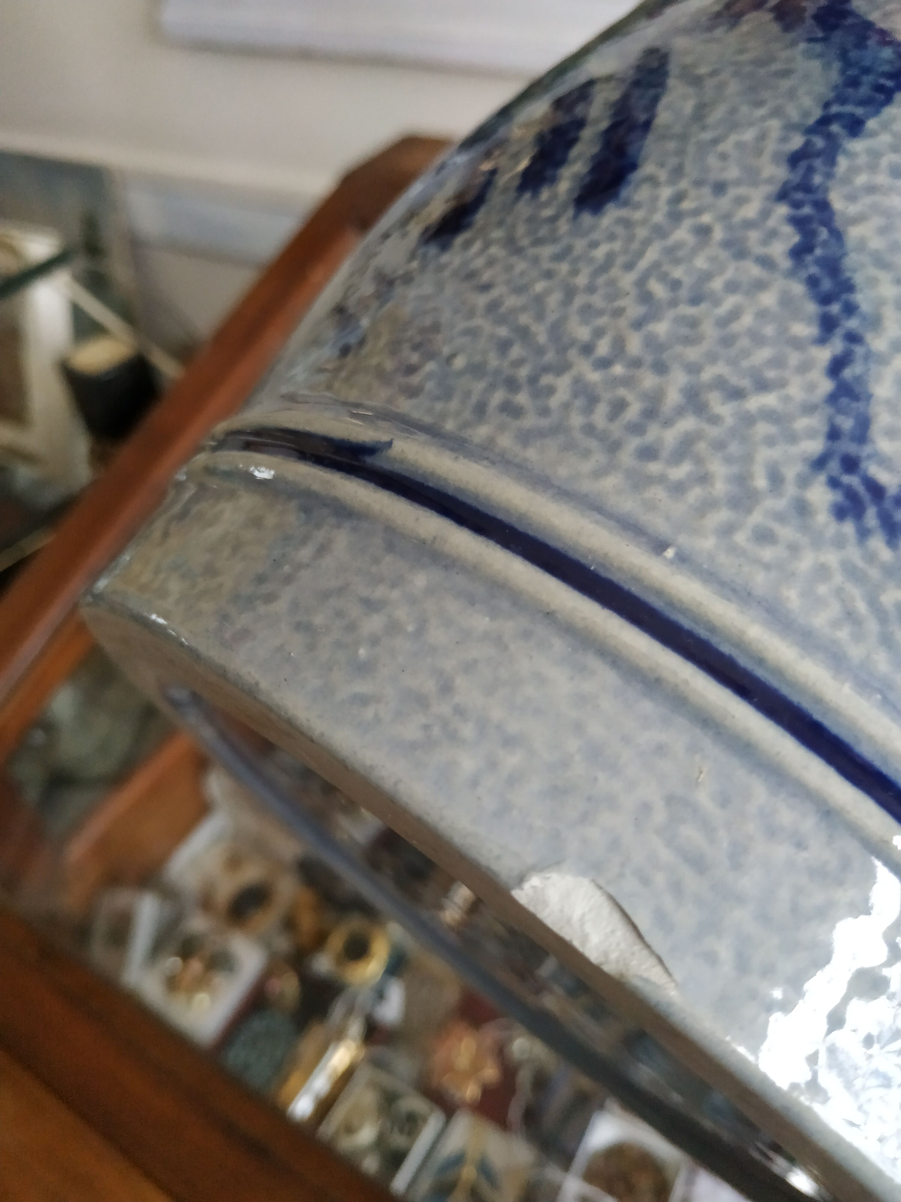 Covered sandstone pot