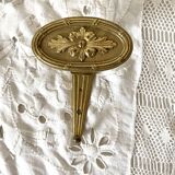 Golden brass coat hook