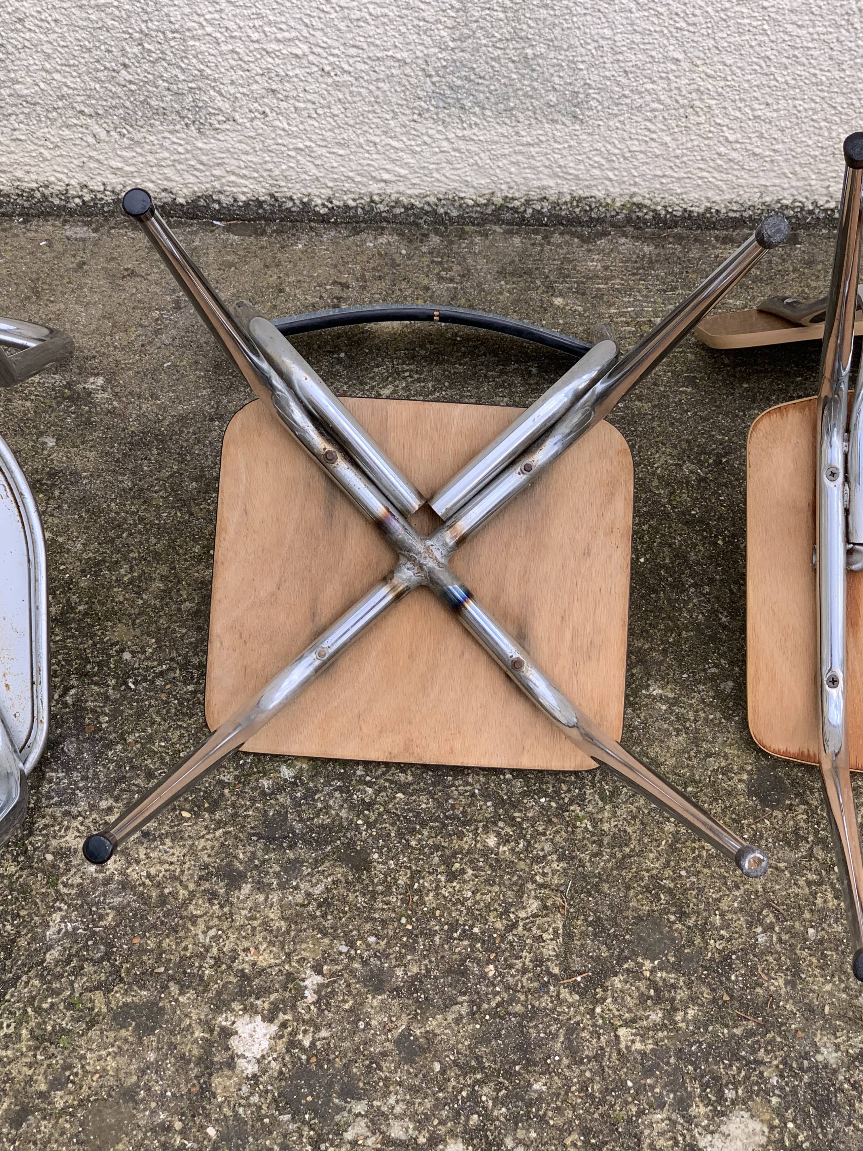 Mismatched formica chairs and stool 1960