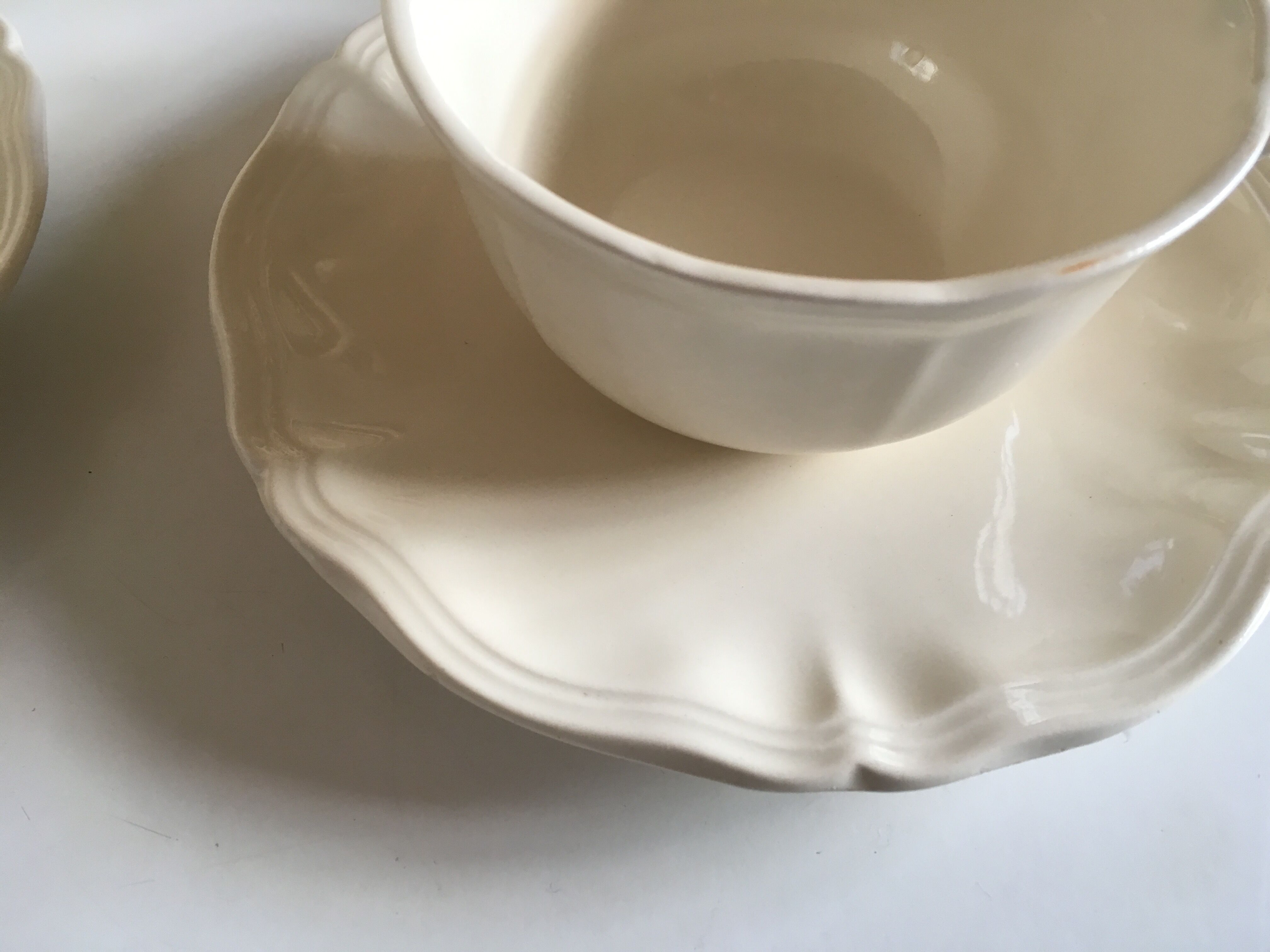 Set of 4 cups breakfasts in faience Sarreguemines ivory to godrons