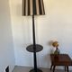 Vintage floor lamp in black patinated wood and striped lampshade
