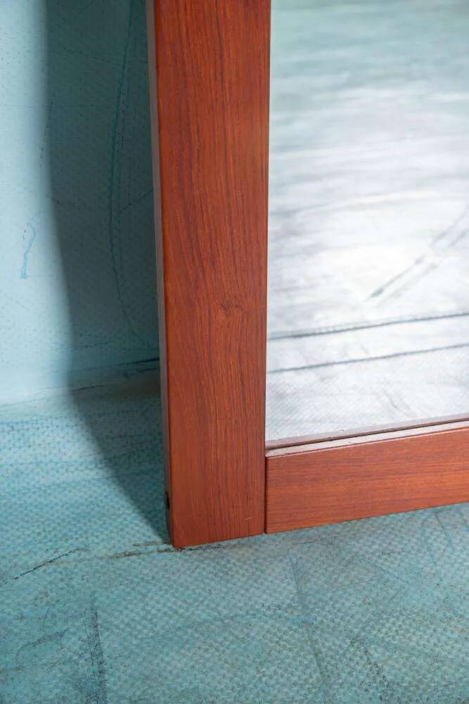 Danish teak mirror with shelf for hats from the 1960s.