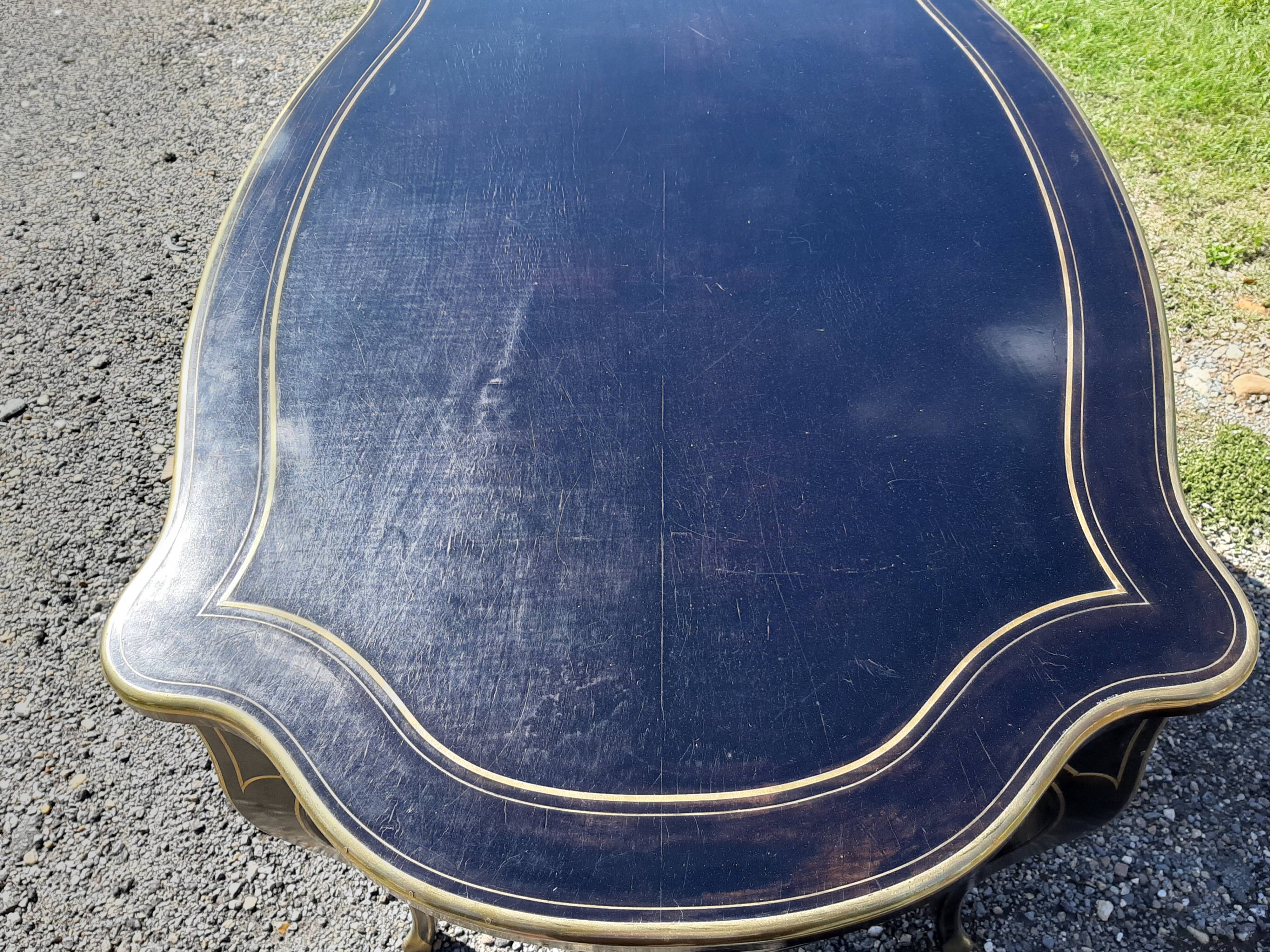 Napoleon III black lacquered wood and brass table