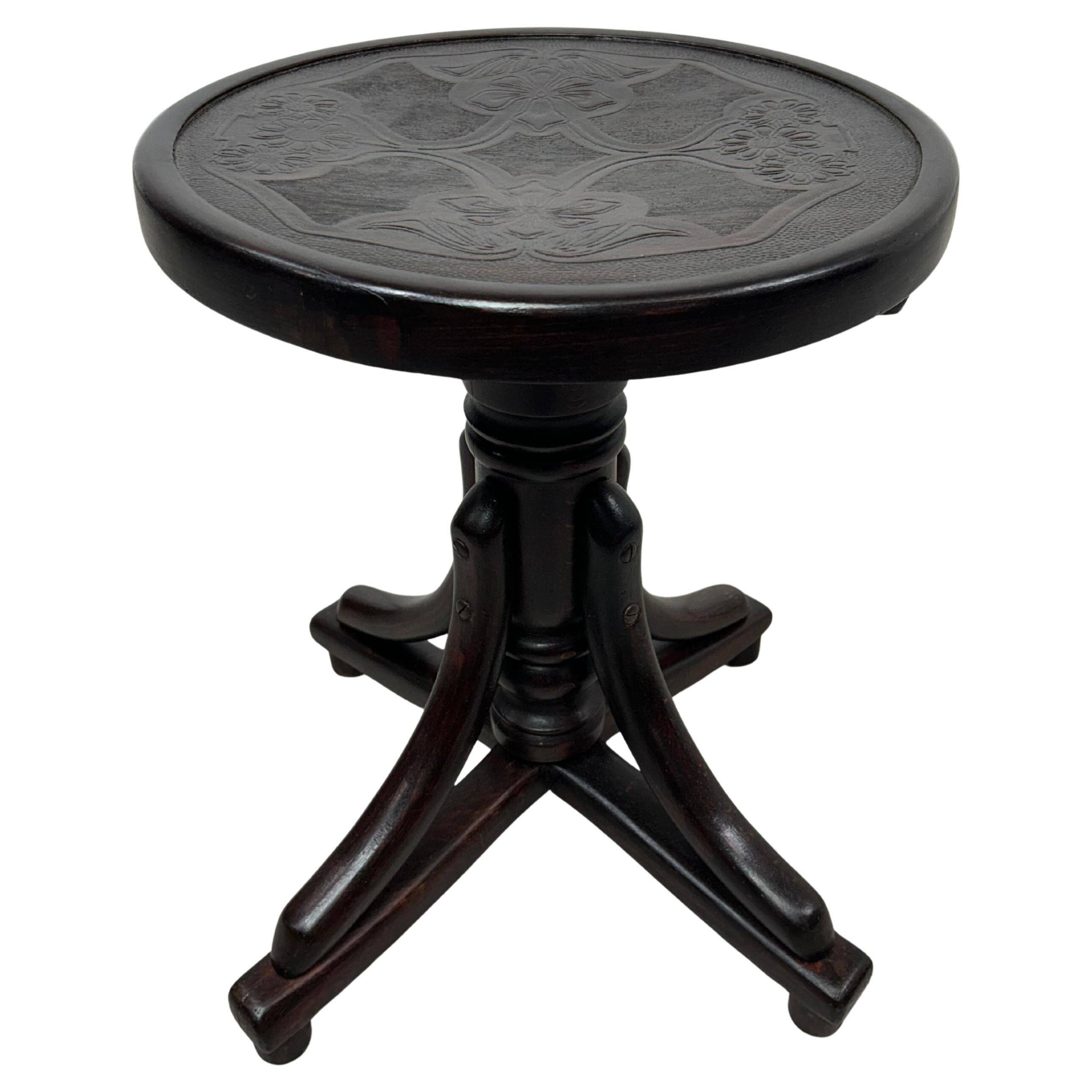 Curved wooden piano chair by Thonet