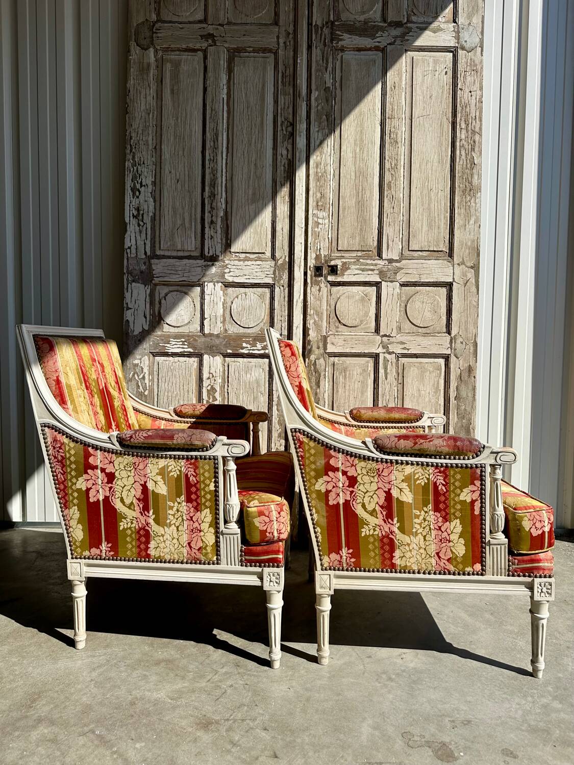 Pair of Louis XVI lacquered bergere chairs circa 1950