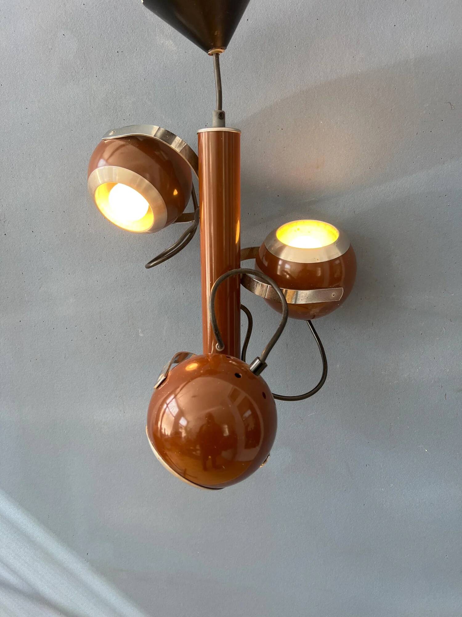 Brown vintage space age pendant lamp with three eyeball shades