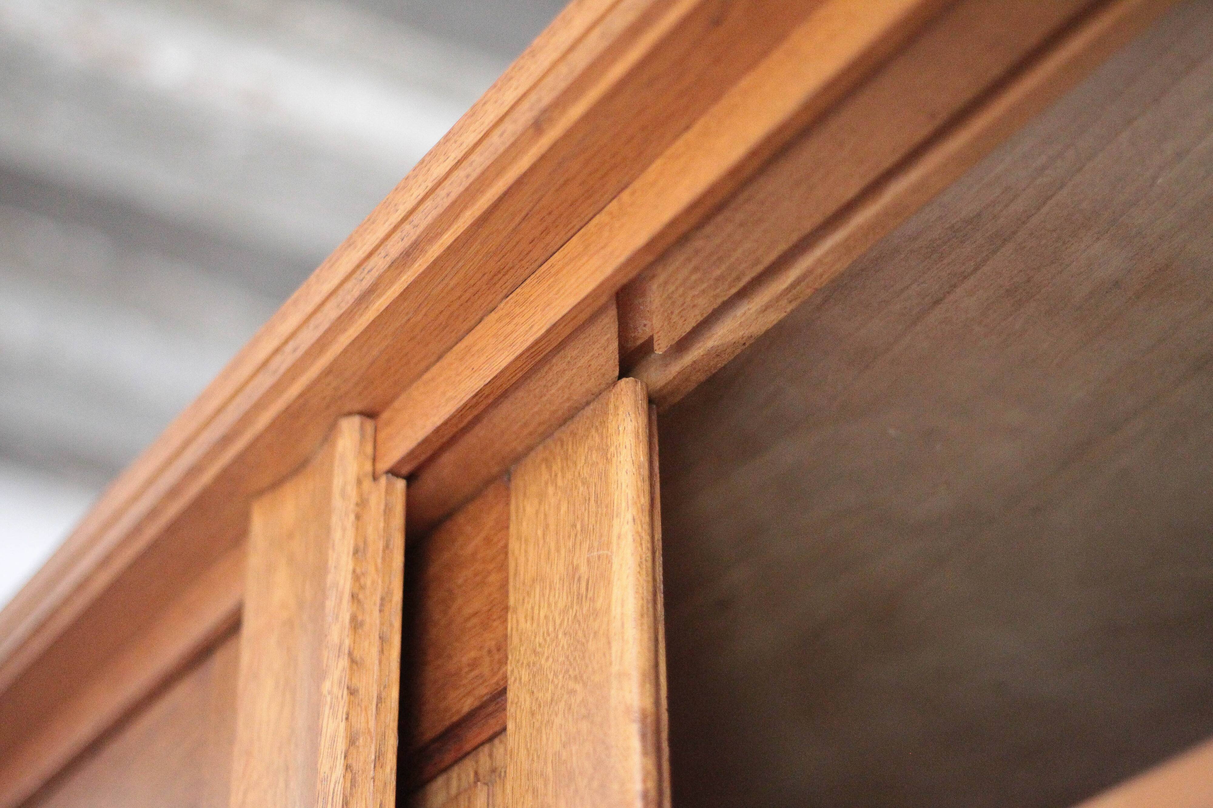 Vintage wooden wardrobe with sliding doors.