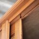 Vintage wooden wardrobe with sliding doors