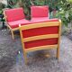 Set of 3 vintage armchairs from the 60s/70s – light wood and red faux leather.