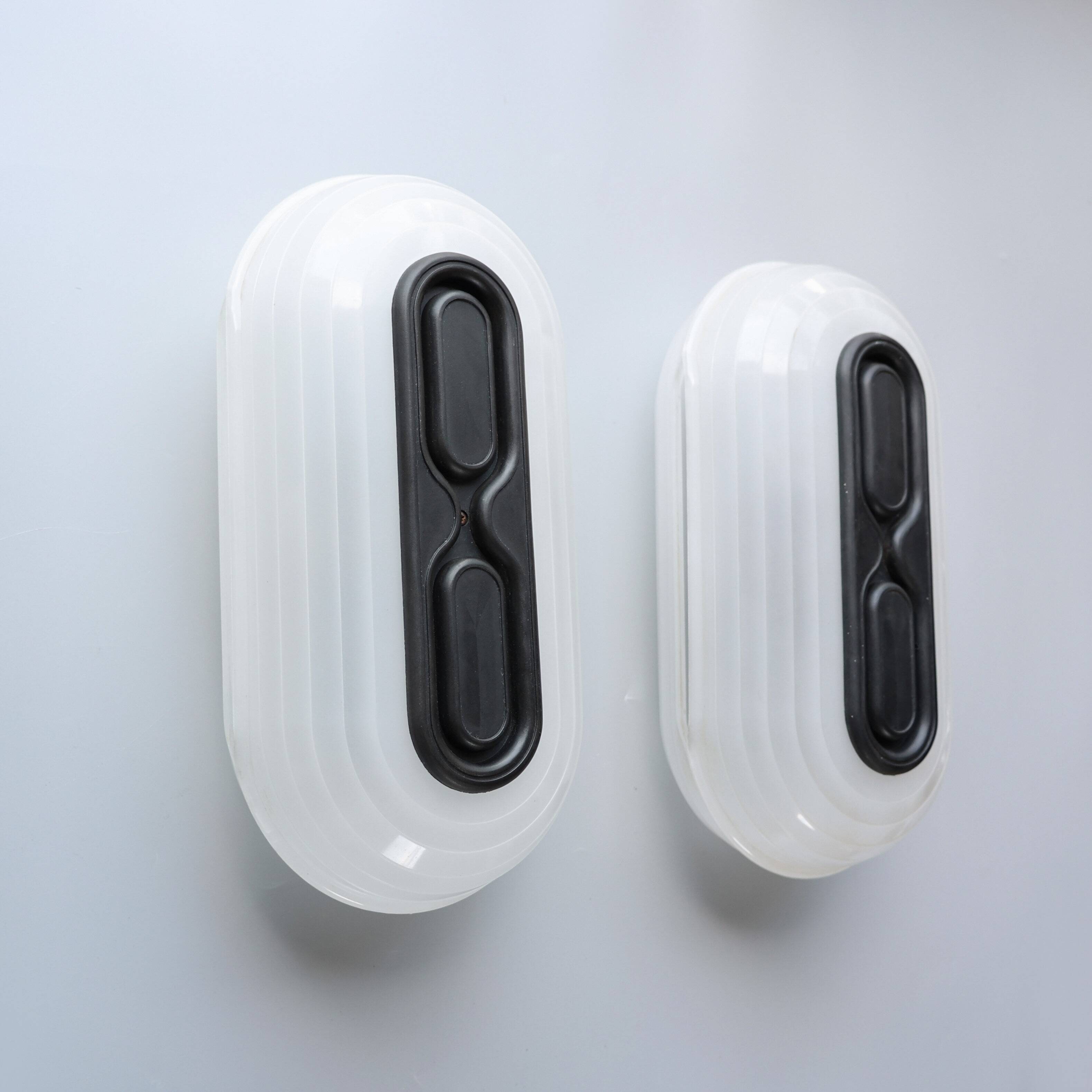 Postmodern sconces by Arteluce, 1980s, Italy.